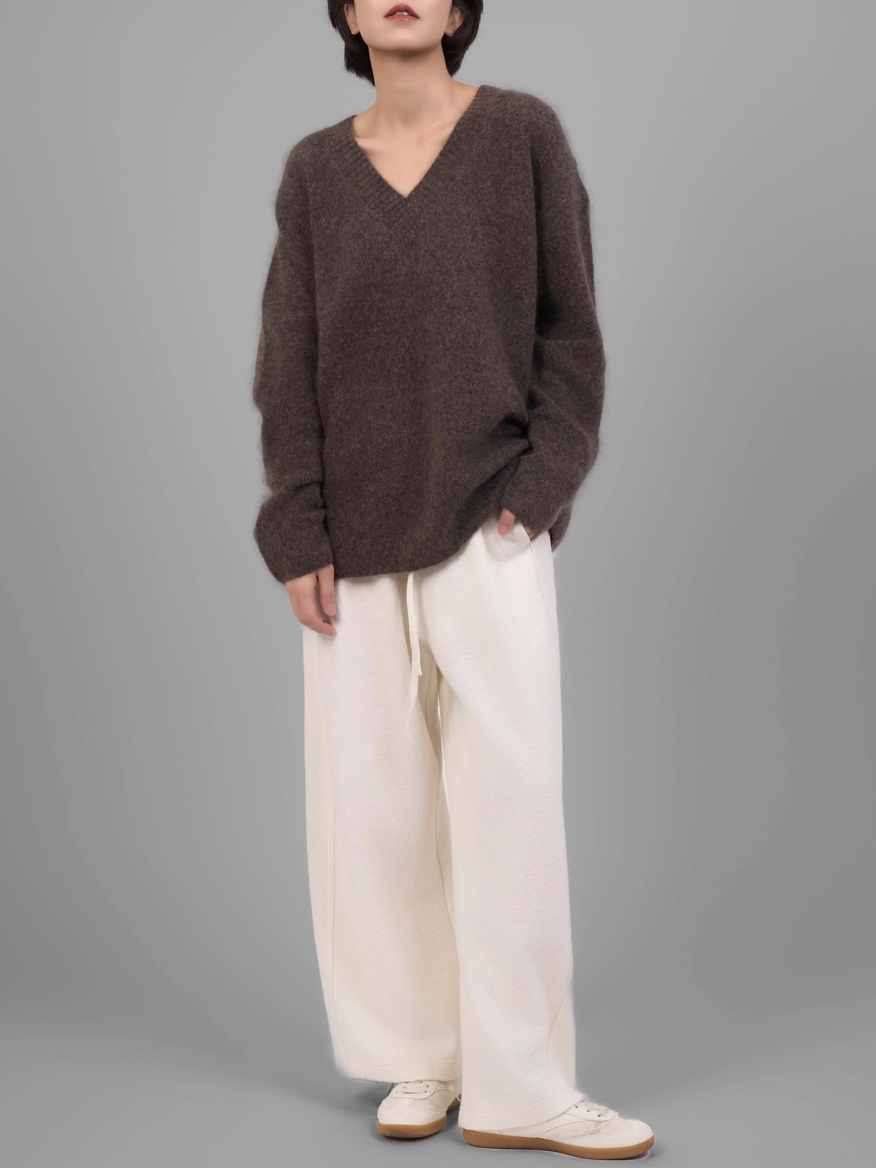 Brown V-neck mohair sweater full-body front view on model