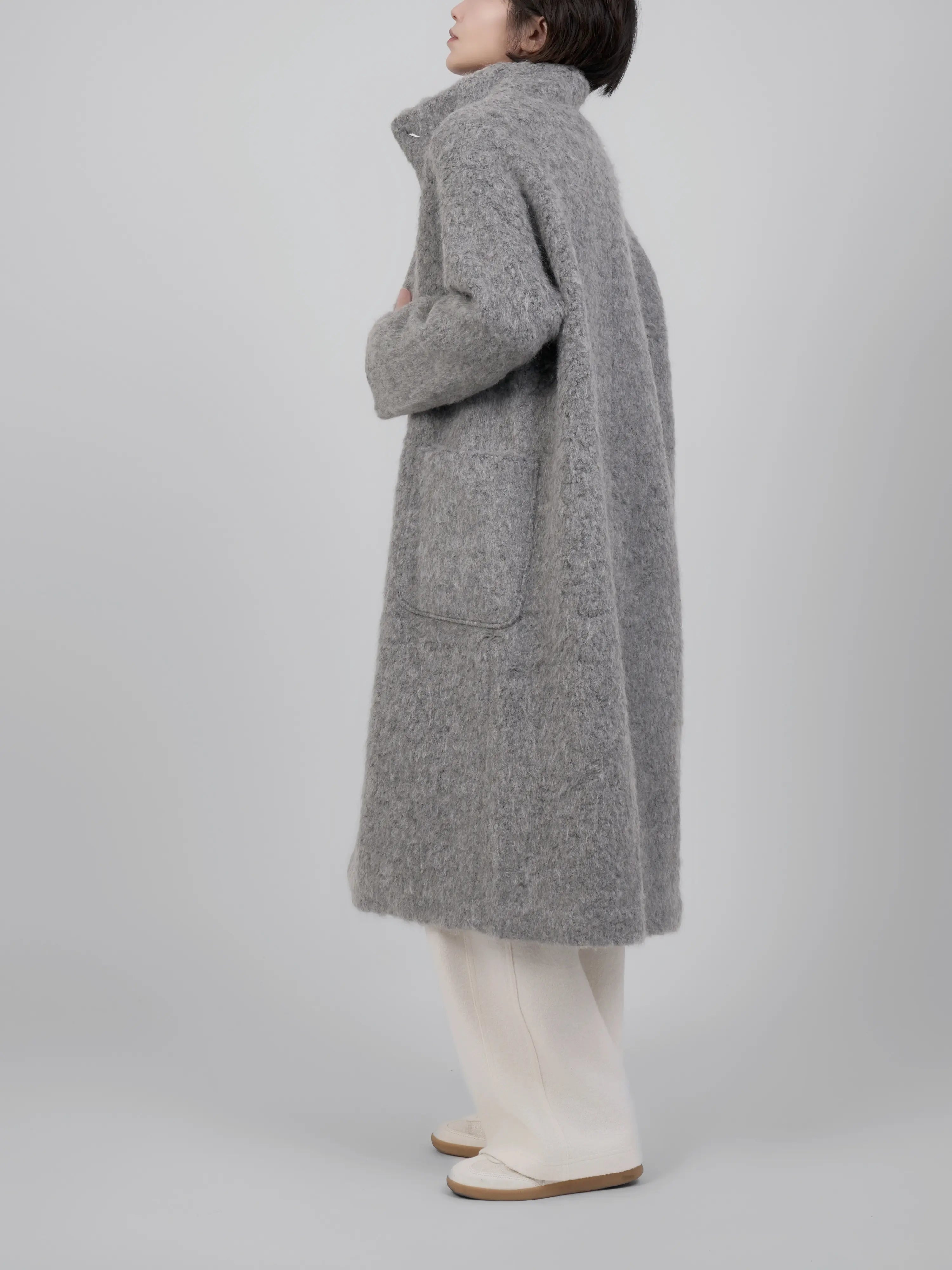 Back view showing minimal design and balanced proportions.