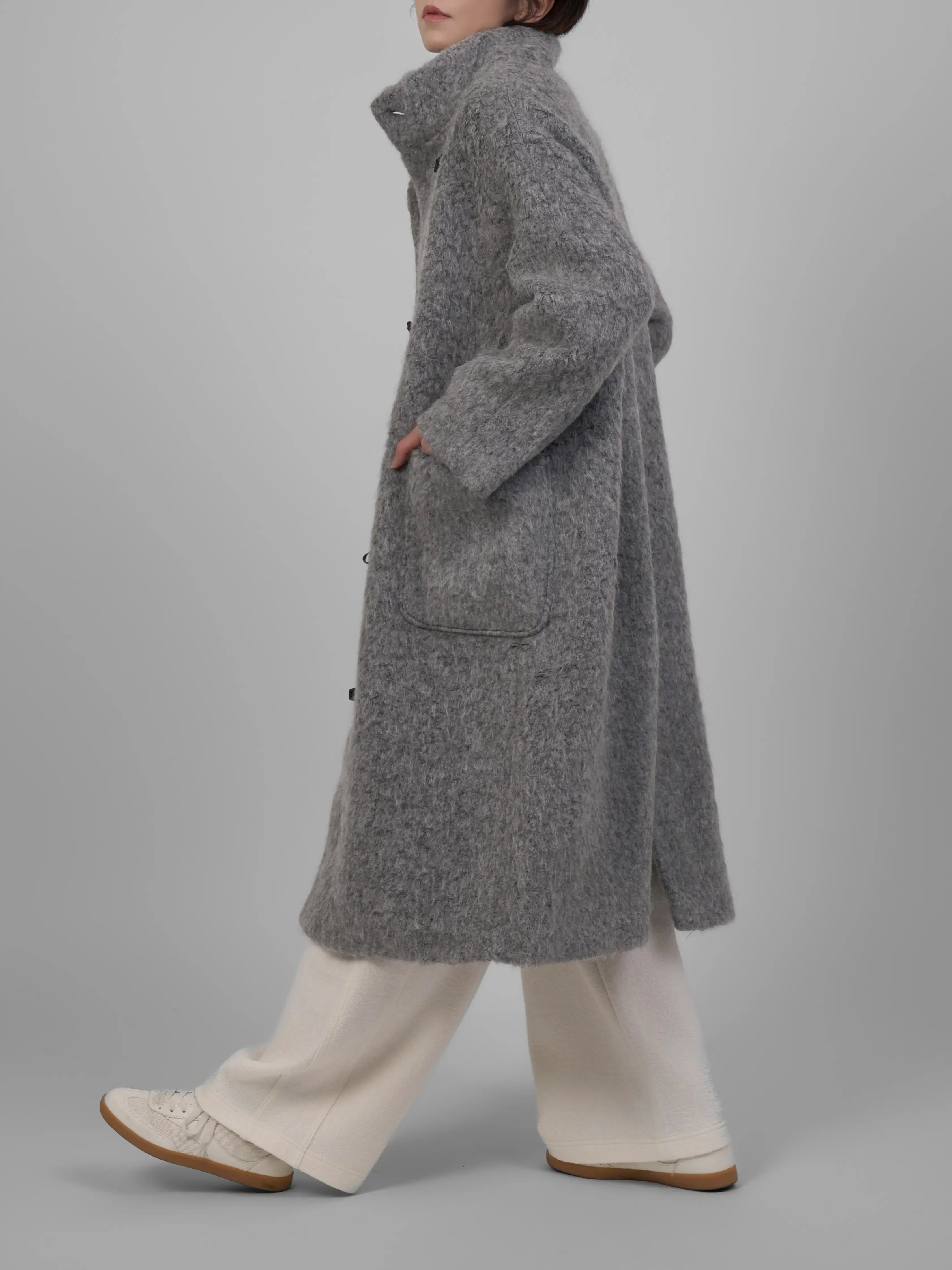 Side view of XXLSMILE Grey Wool Toggle Coat highlighting clean straight tailoring and full-length design.