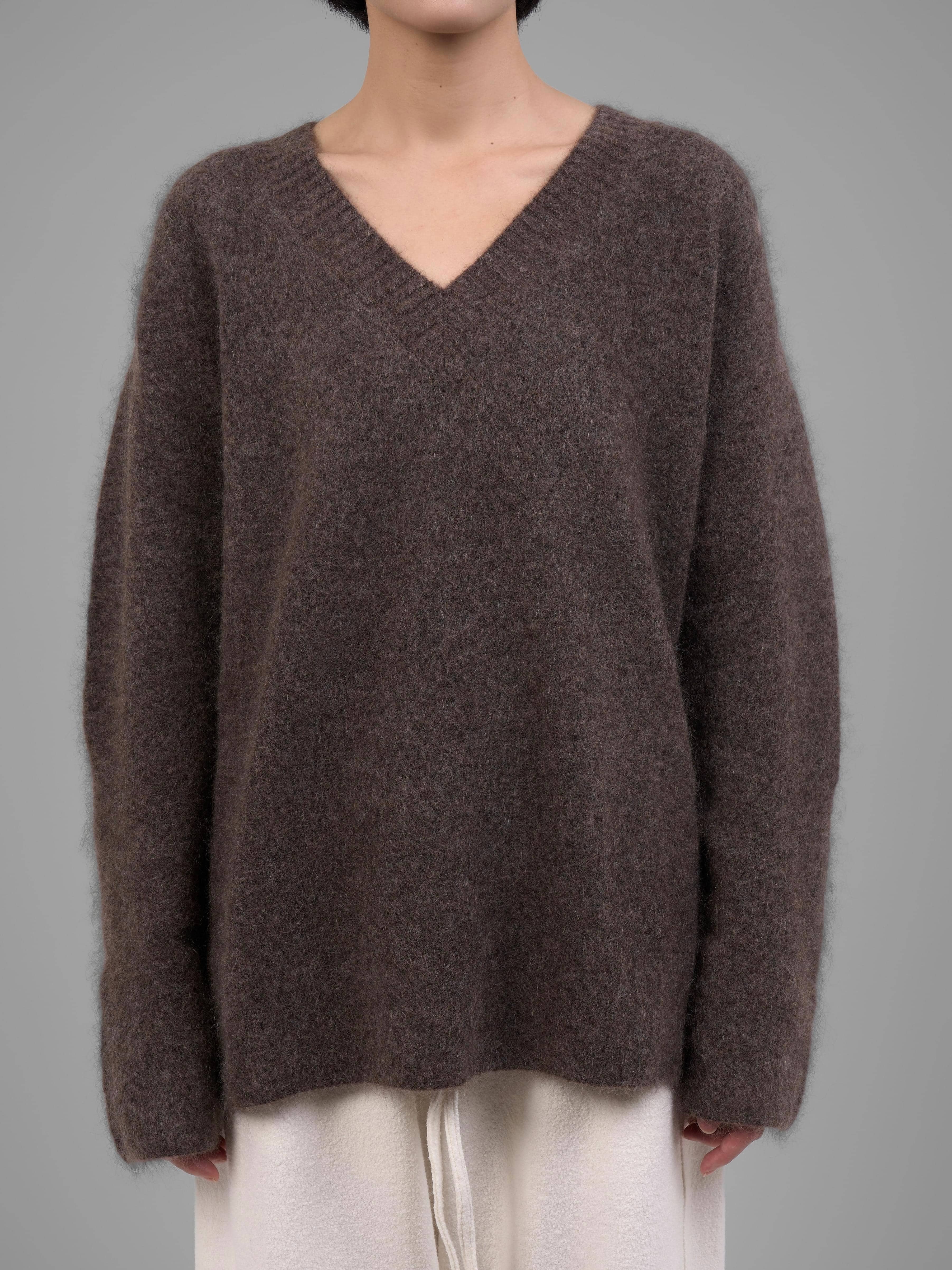 Brown V-neck mohair sweater close-up showing texture and neckline