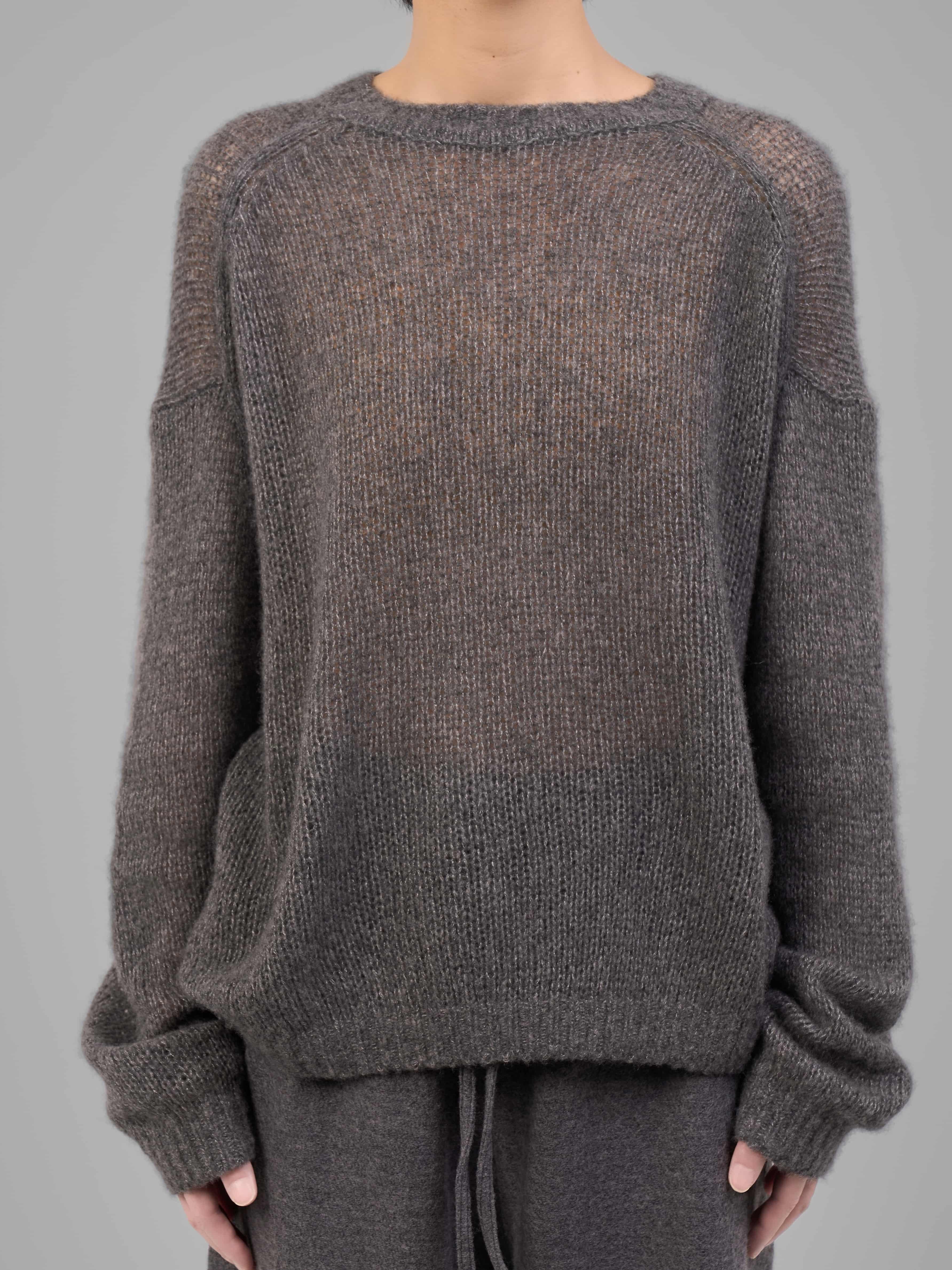 Front close-up of grey cashmere-silk knit sweater highlighting texture and neckline.