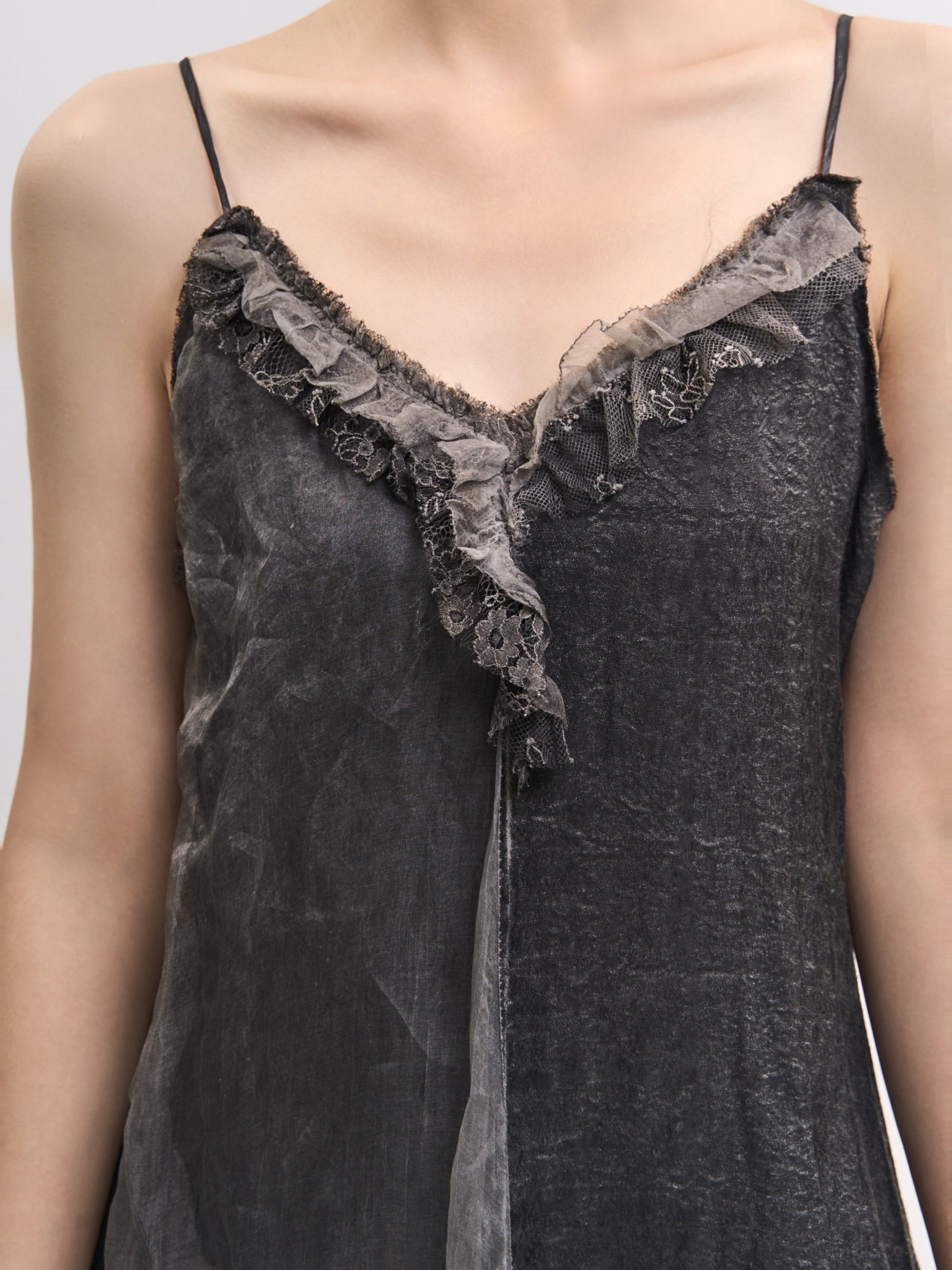Close-up neckline detail of Mist Veil Dress showing textured trim and soft silk–linen blend.