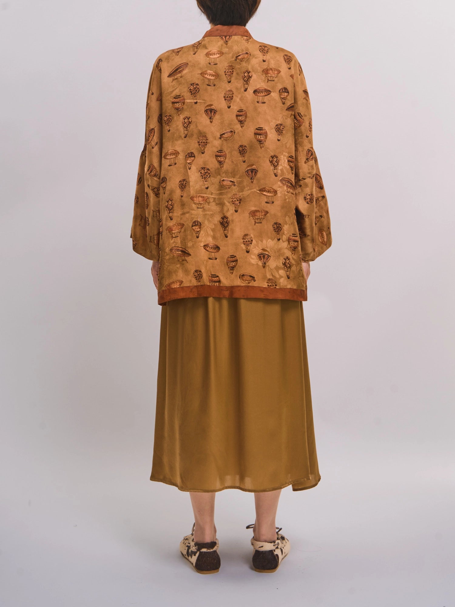 Back view of mulberry silk Xiangyunsha top showing jacquard pattern and relaxed drape.