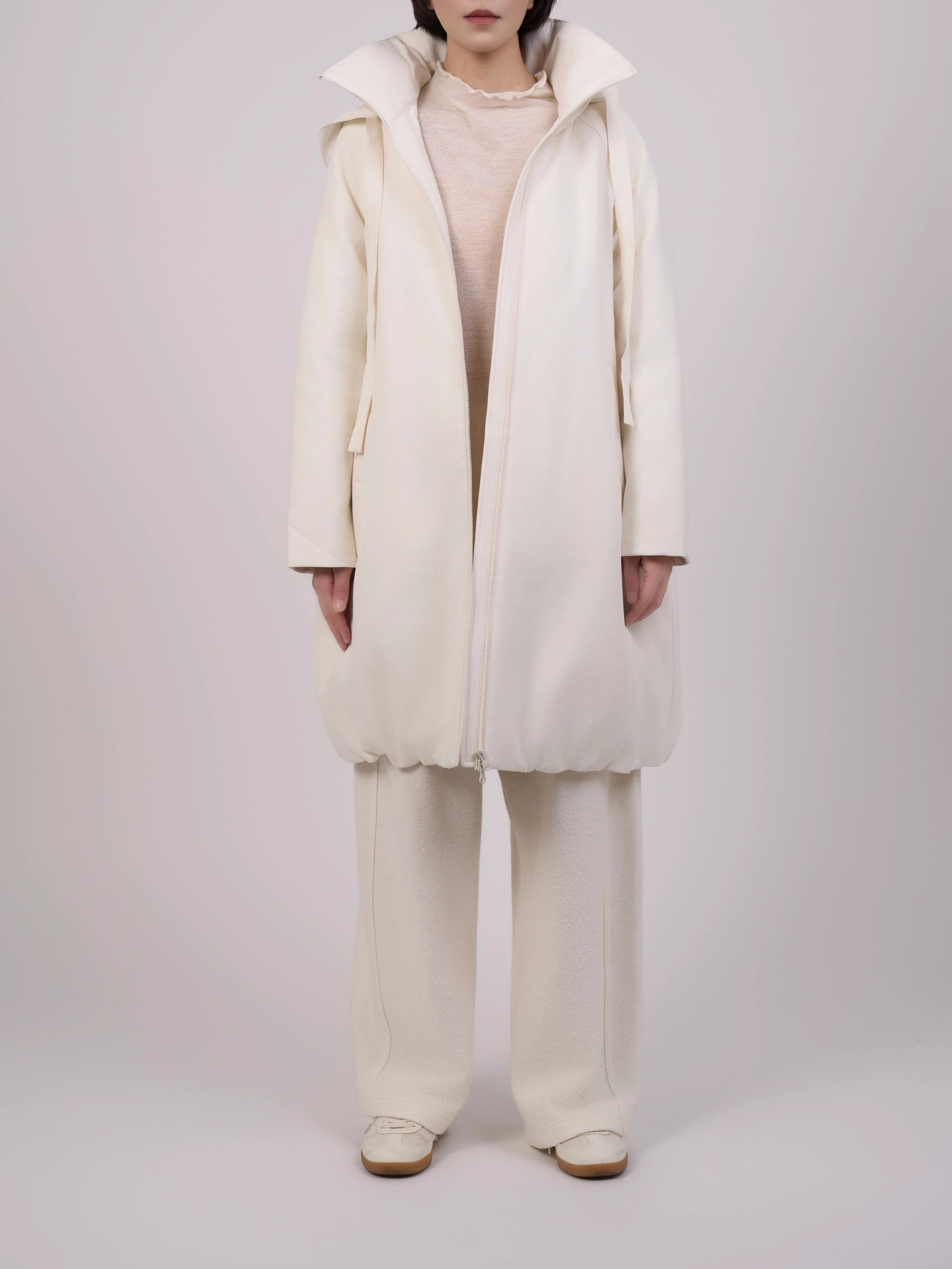 Off-White Hooded Down Coat full-body front view on model, showcasing minimalist winter outerwear.