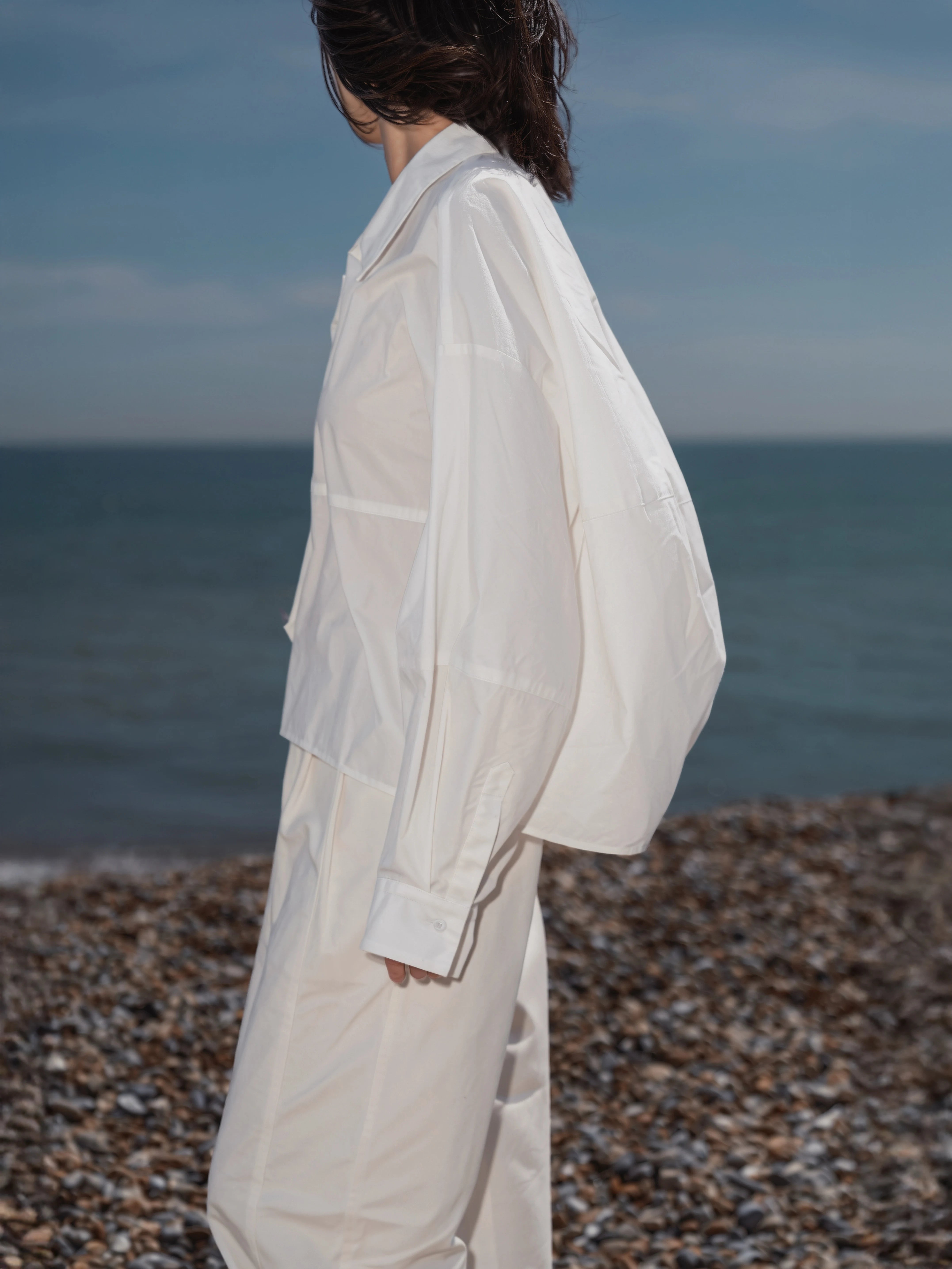 Back-side view of the Pima Boxy Shirt in white.