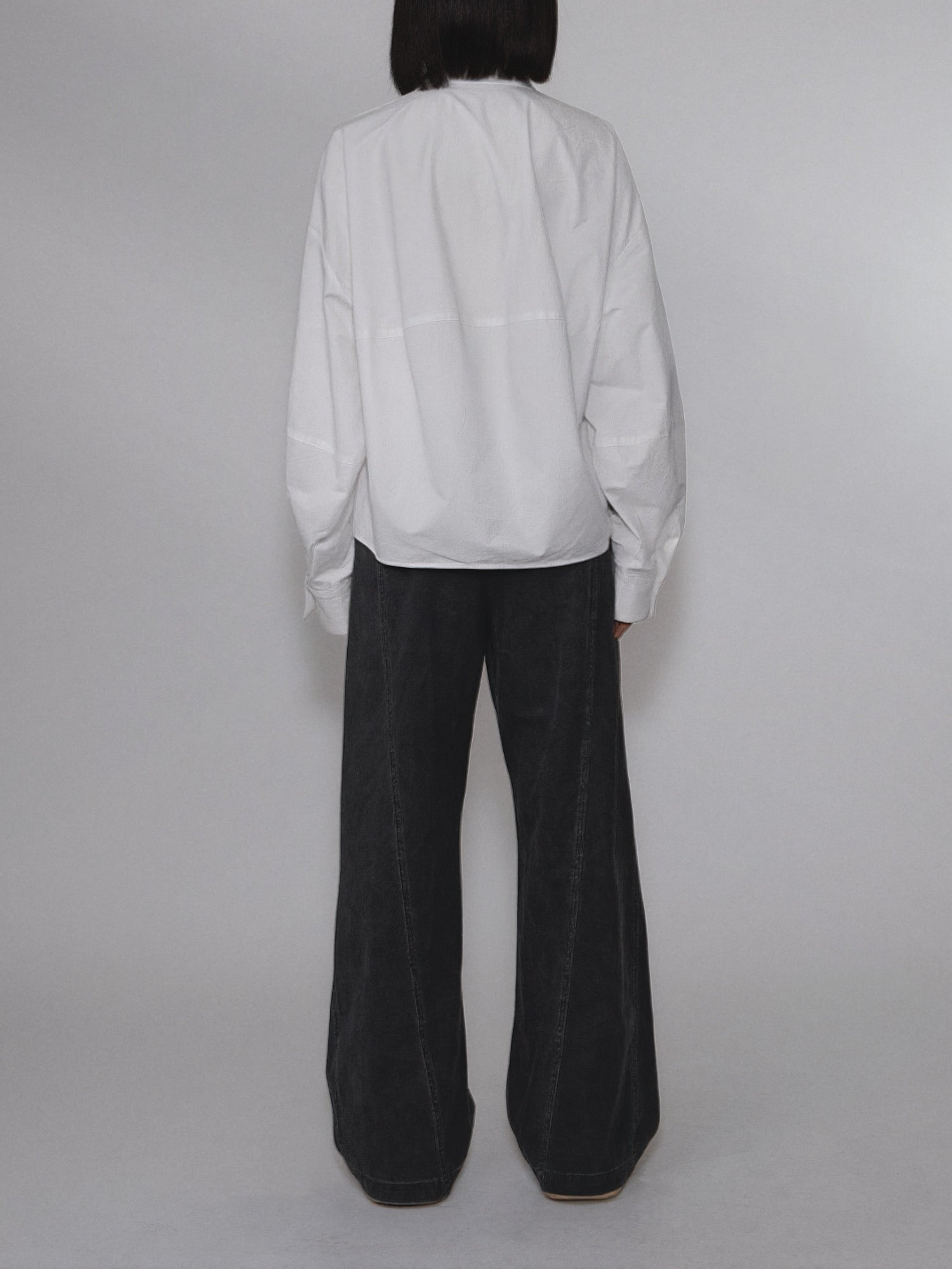 Back view of the Pima Boxy Shirt in Soft Cream featuring the relaxed boxy silhouette.