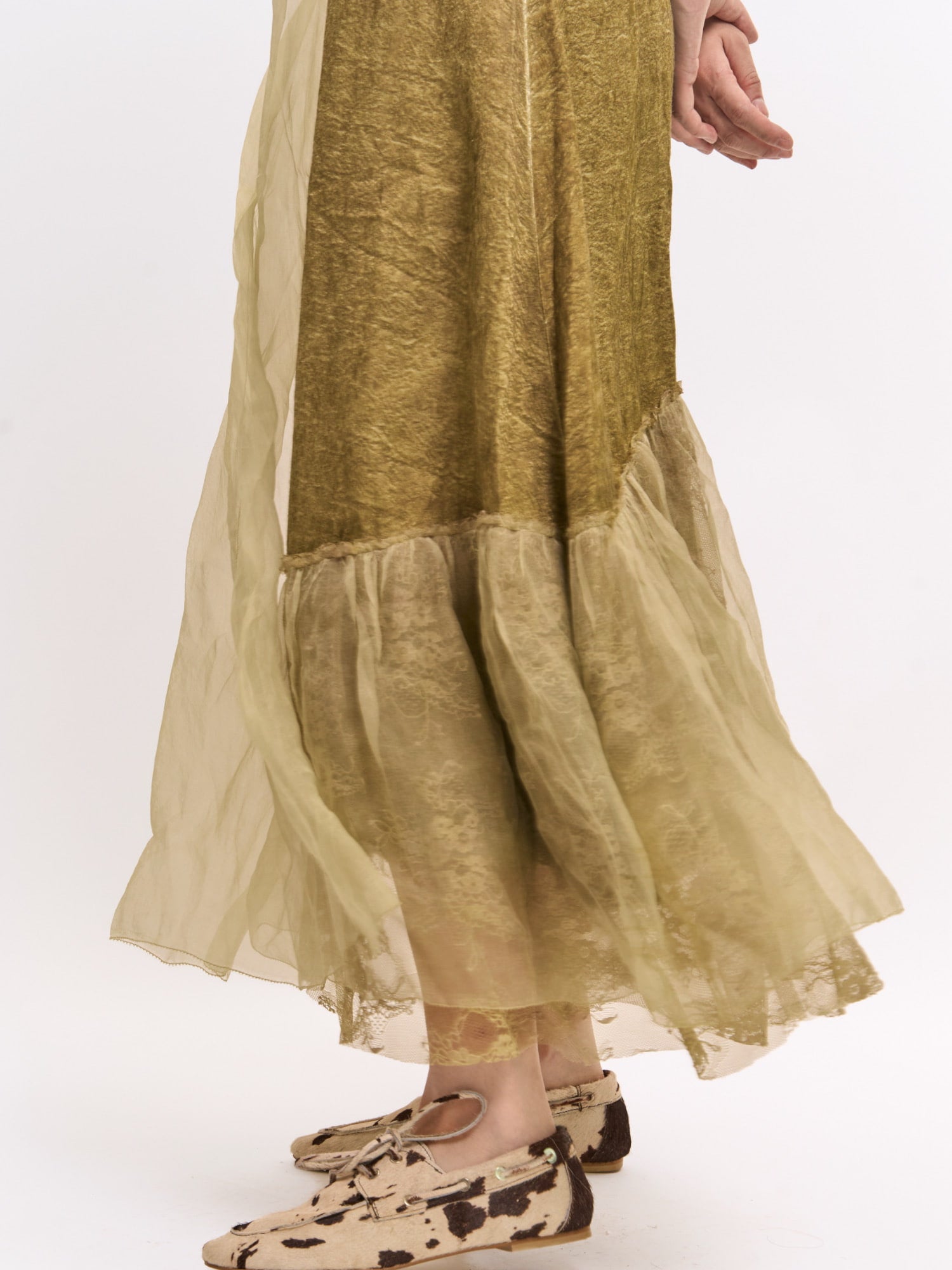 Hem detail of Verdant Veil Dress showing airy layered silk and fluid textured movement.