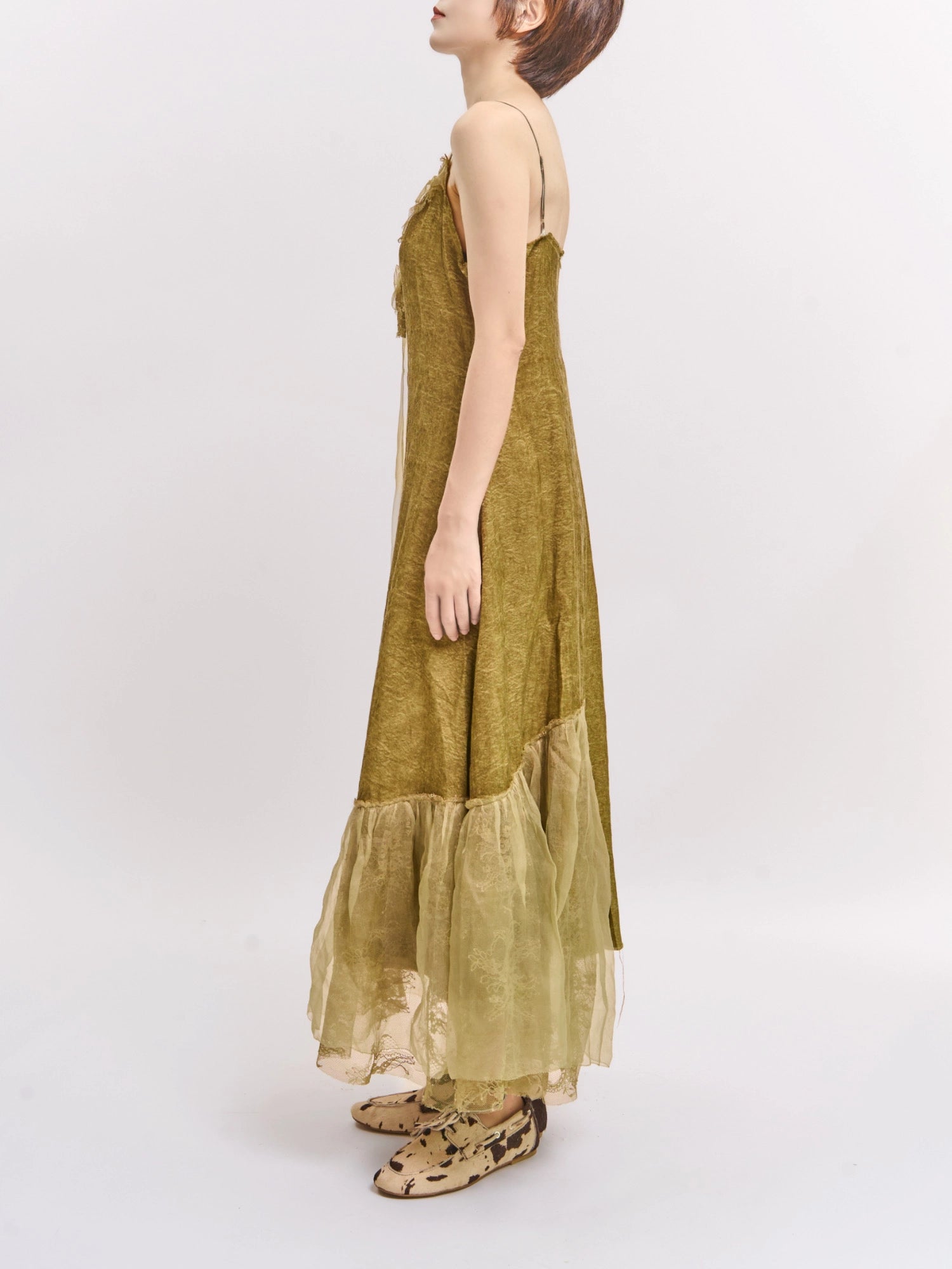 Side view of Verdant Veil Dress highlighting natural drape and relaxed modern silhouette.