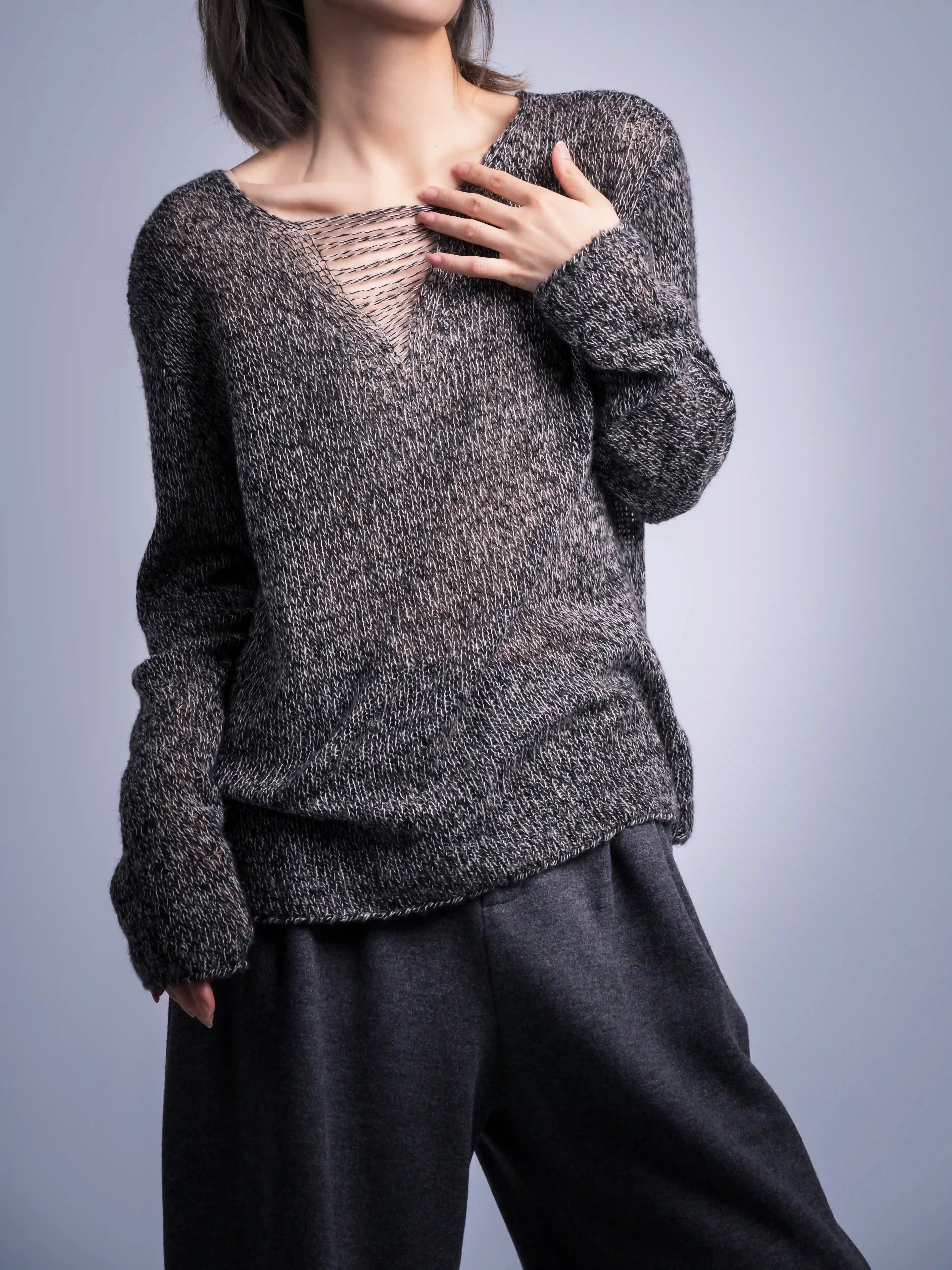 Front view of brown wool jumper, relaxed V-neck look, slightly tucked for a natural drape and everyday styling.